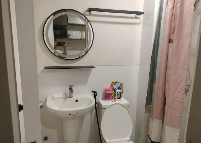 Cozy Wooden Design Unit At 7 Edsa Apartment Manila