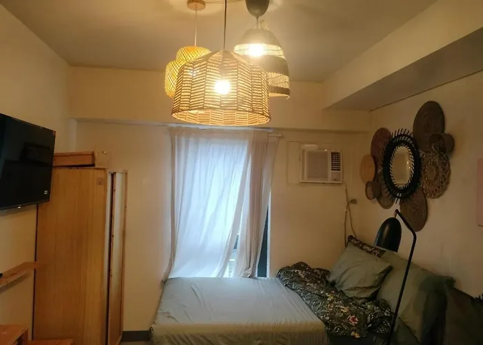 Cozy Wooden Design Unit At 7 Edsa Apartment Manila